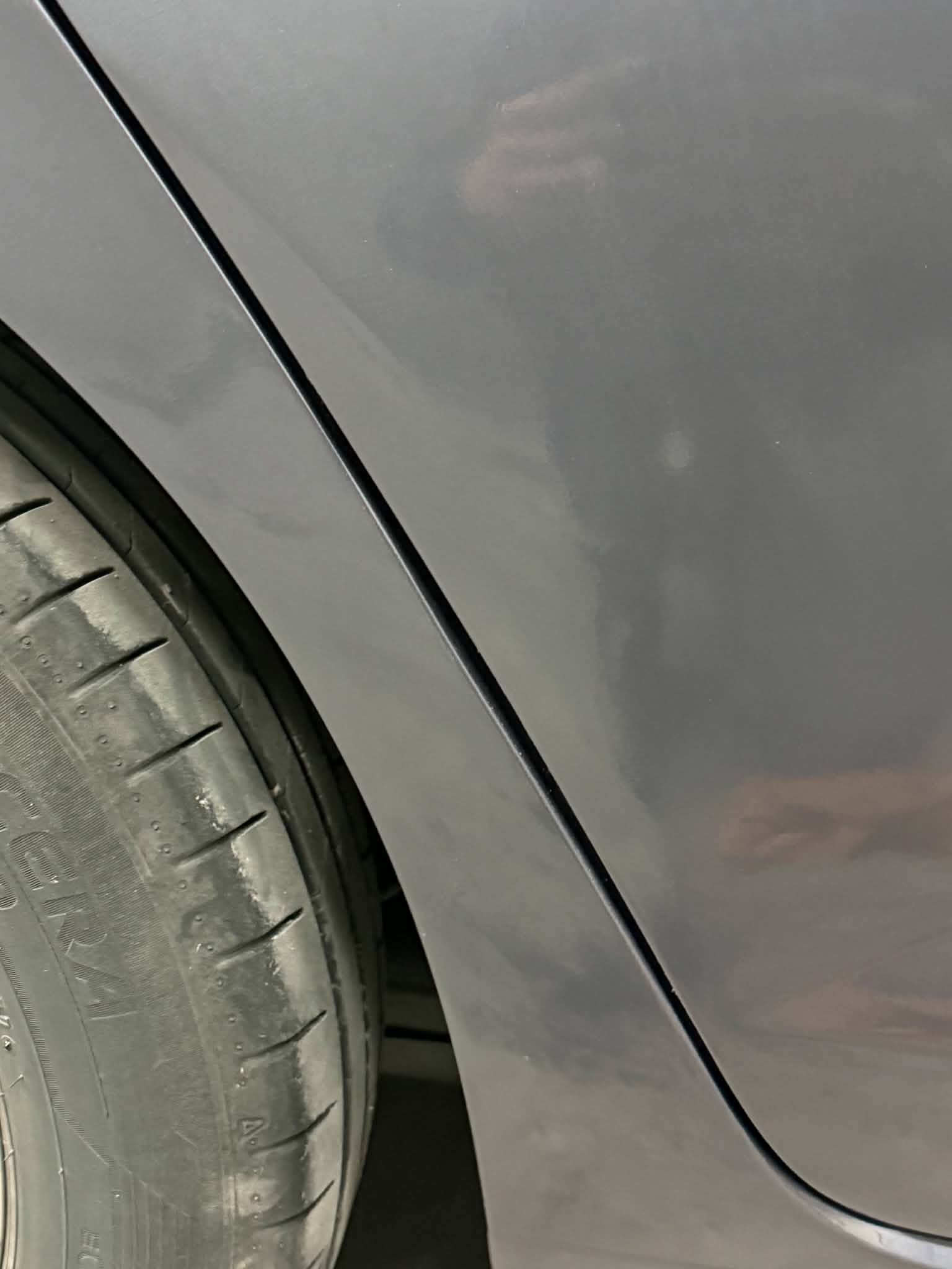 Close up of the finished paint on the rear wheel arch
