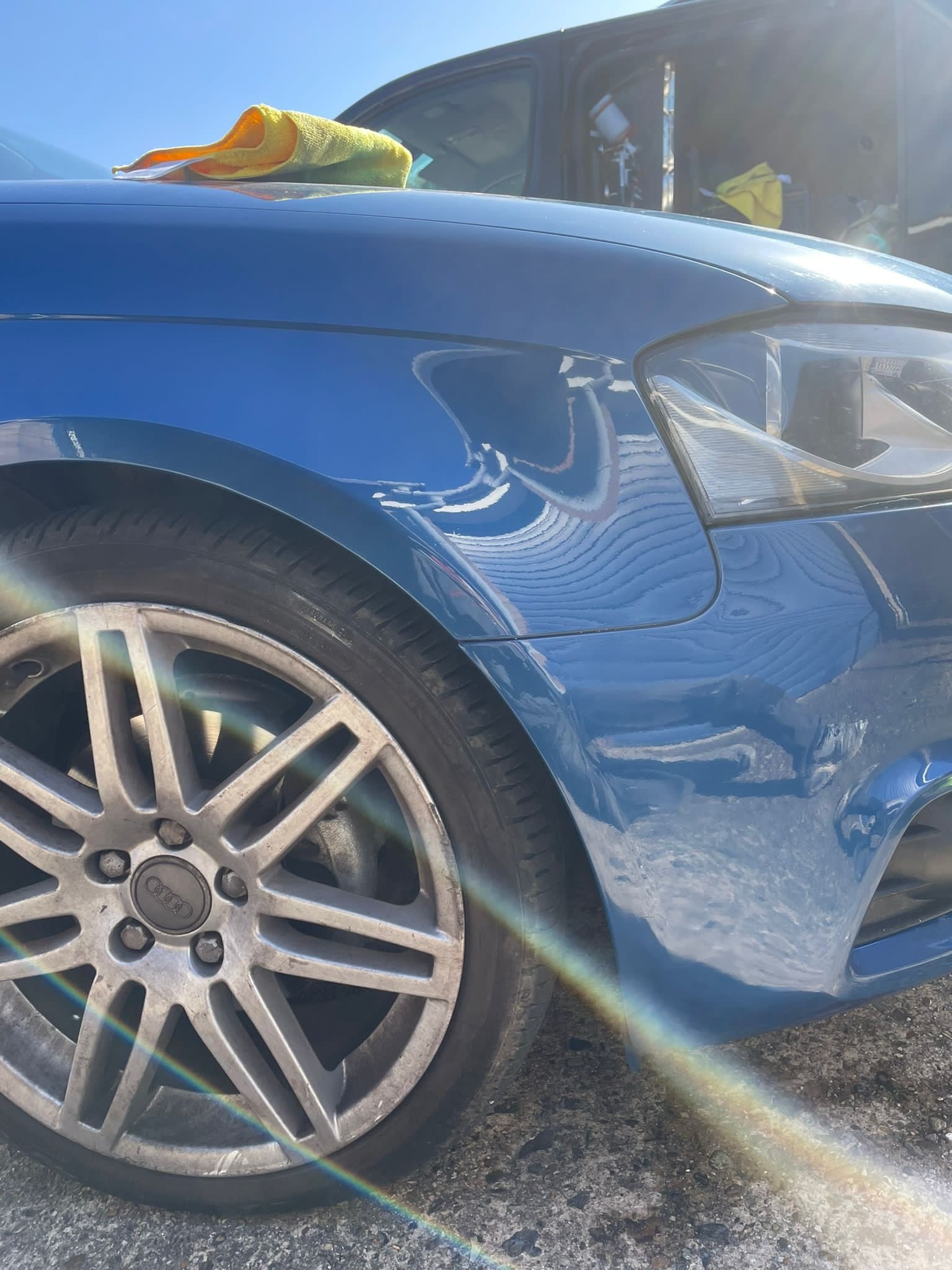 A blue Audi front wing repaired and refinished